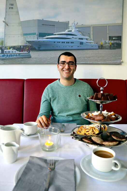 A coffee with temporary helper Mehdi Kebdani